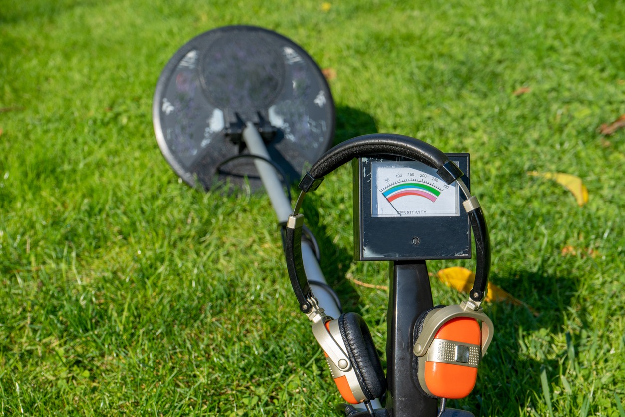 a metal detector on the lawn