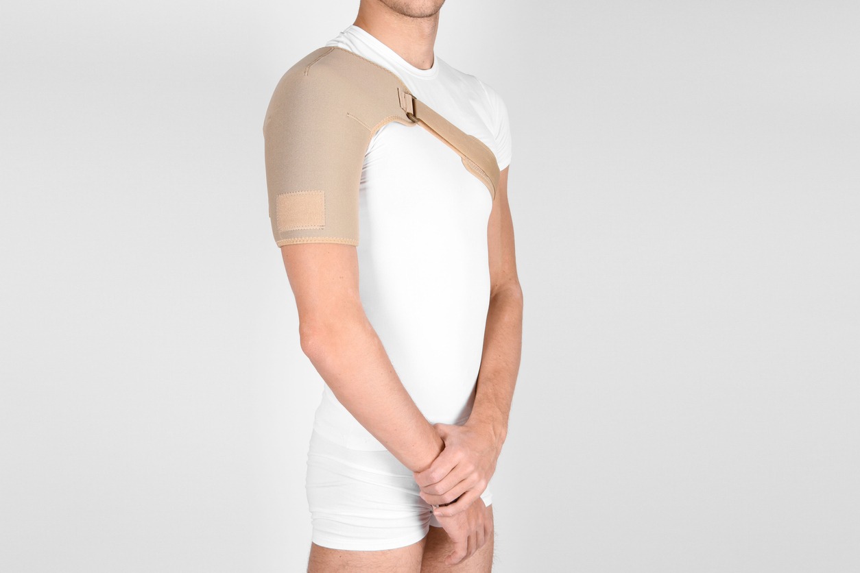 man wearing a shoulder brace