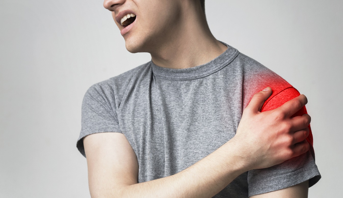 man with shoulder pain