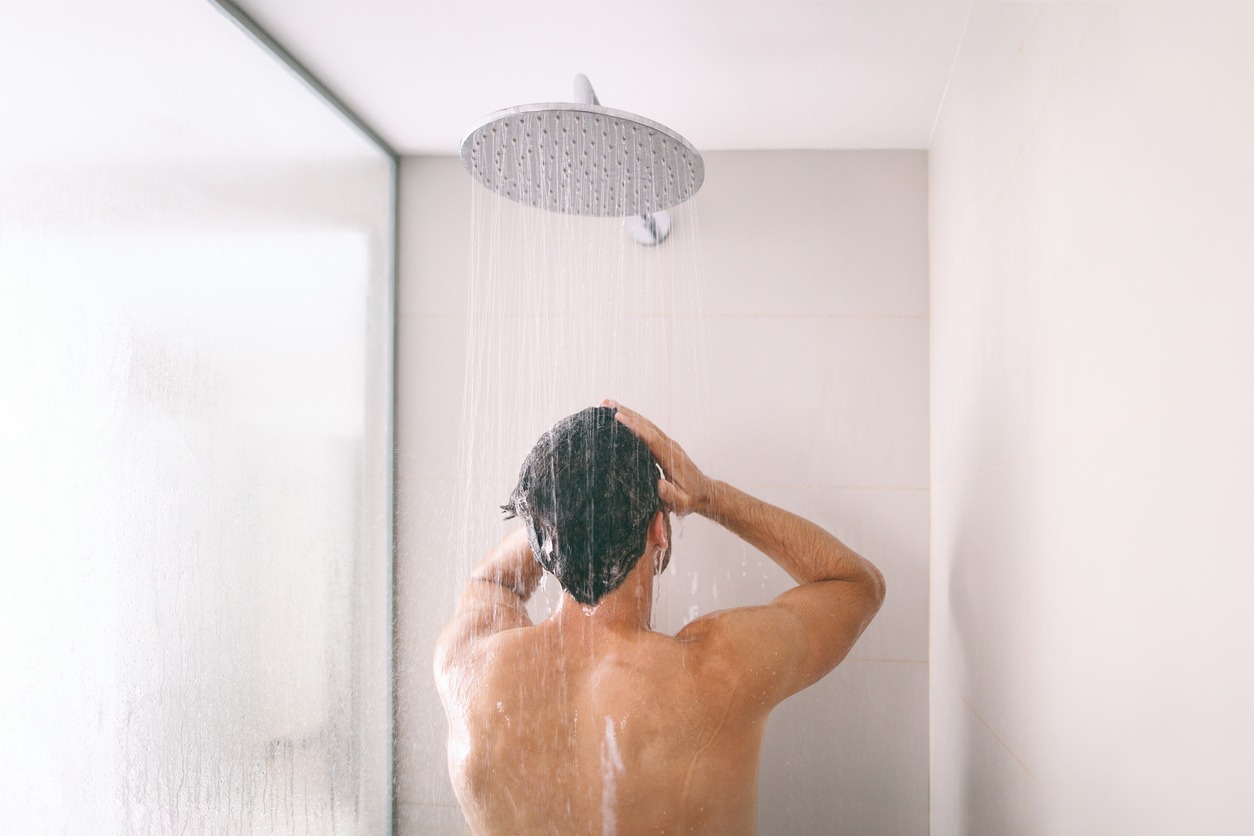 man taking a shower