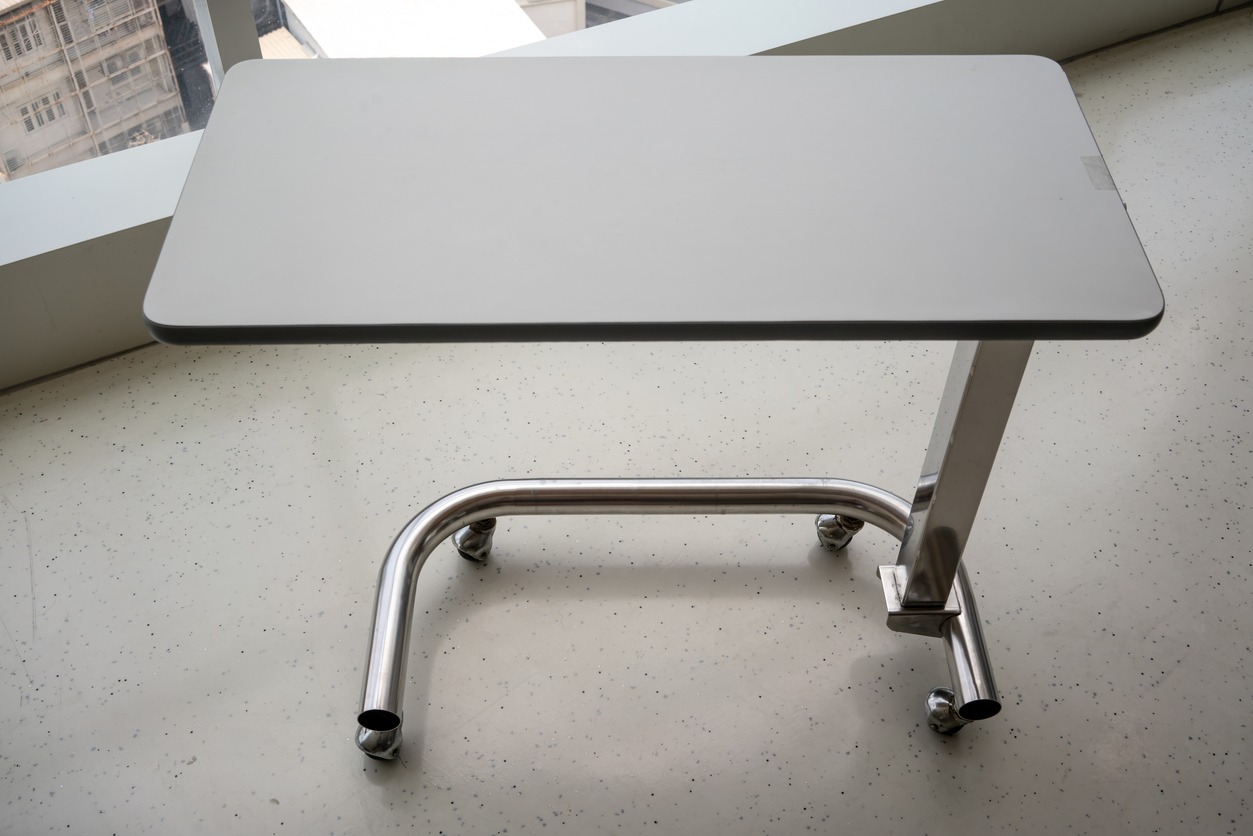 an overbed table in a room