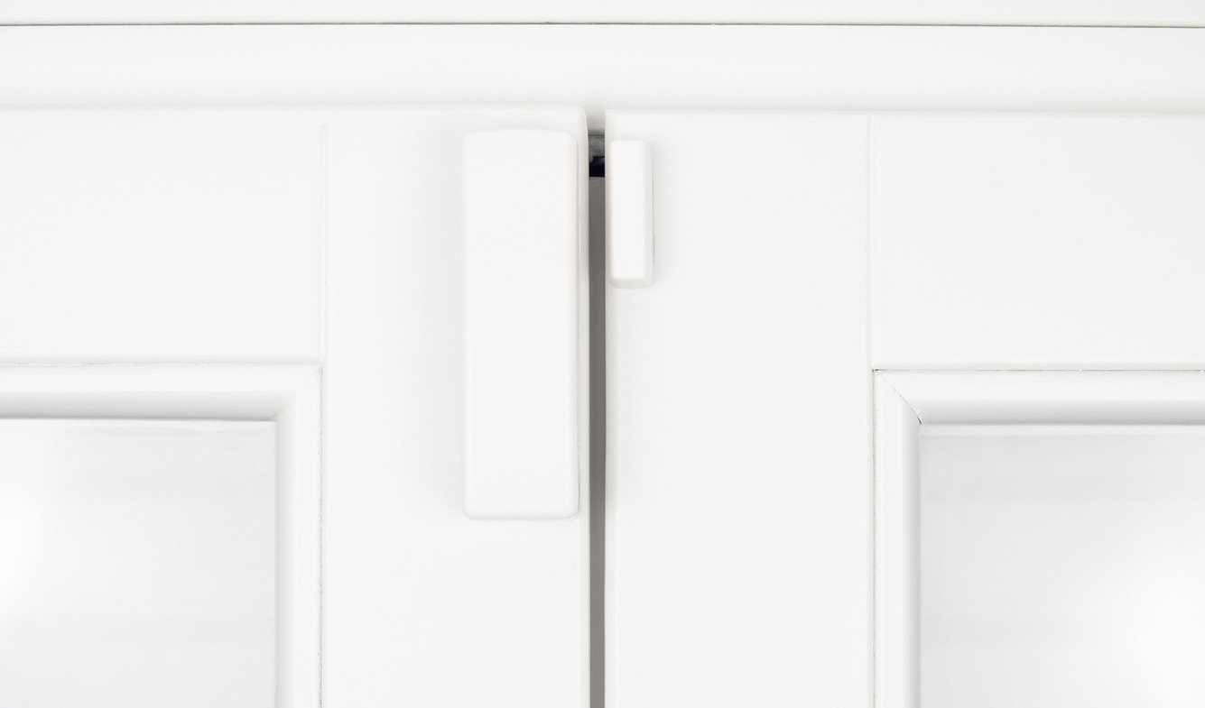 wireless alarm sensor installed on the door