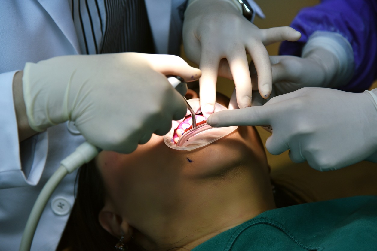 patient undergoing dental procedure in the clinic