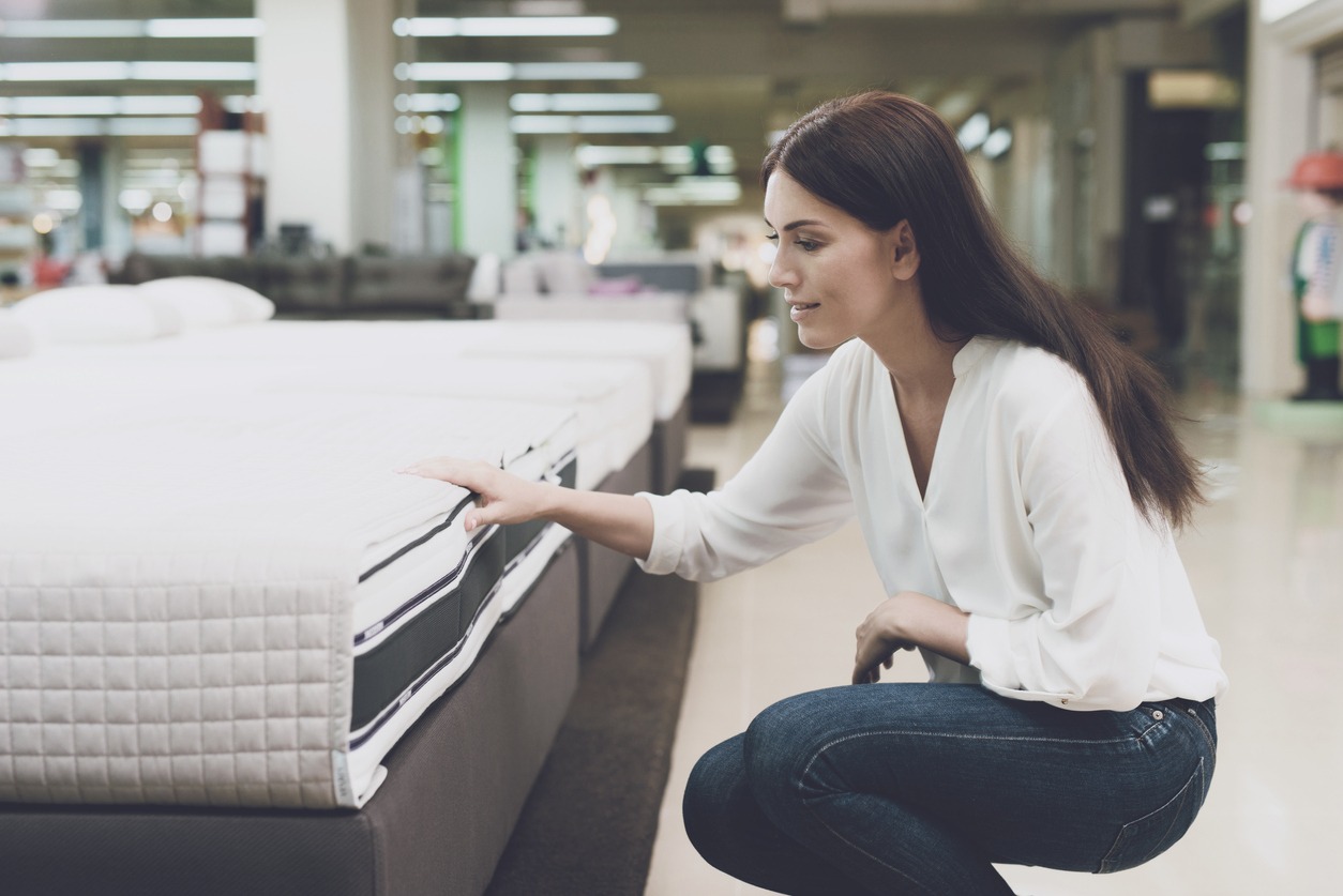 woman choosing a mattress