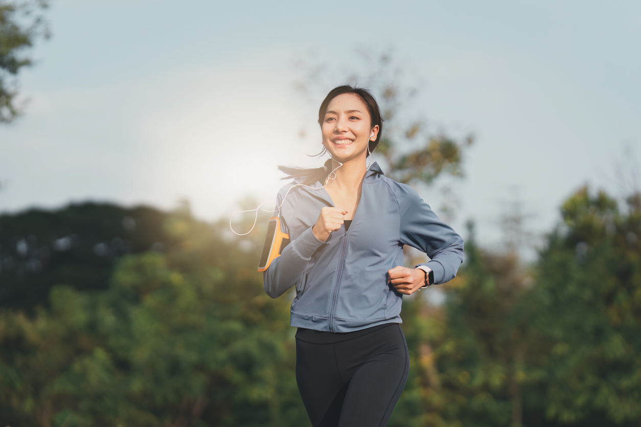 A young woman jogging outdoors