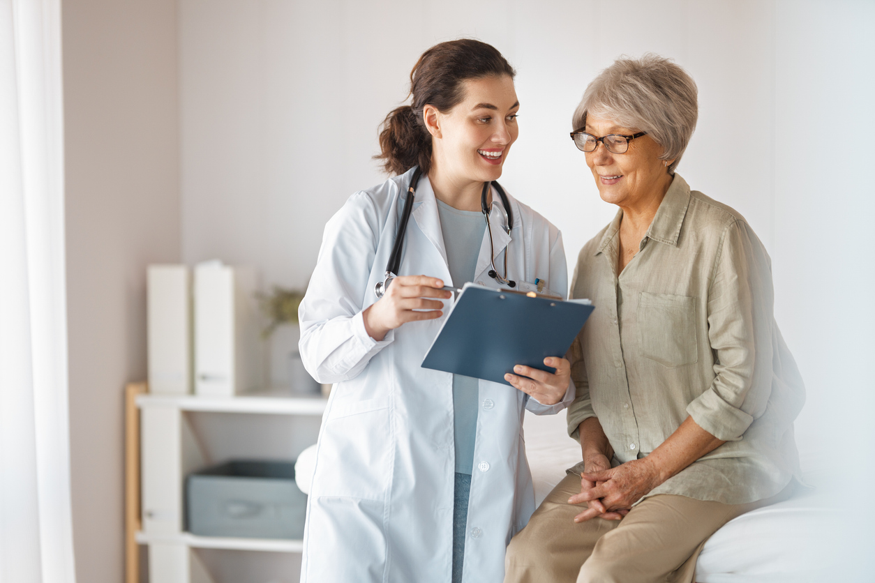 Patient with a doctor in medical office