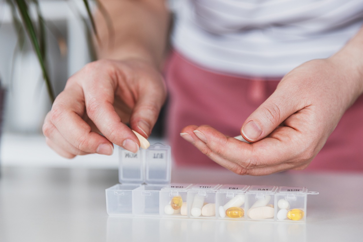 organizing pills in a medication dispenser