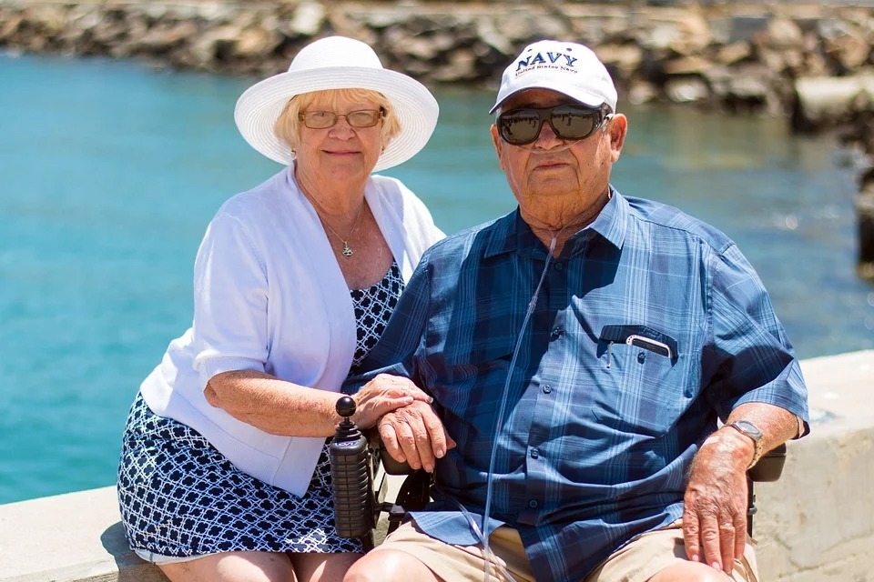 An elderly couple at a beach