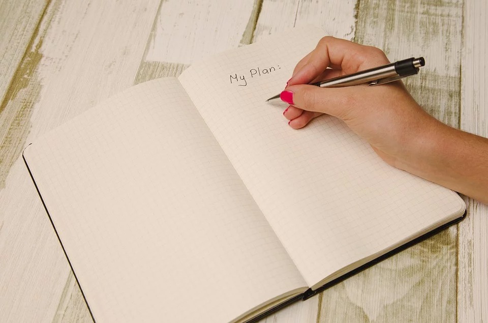 “My Plan” written on a notebook