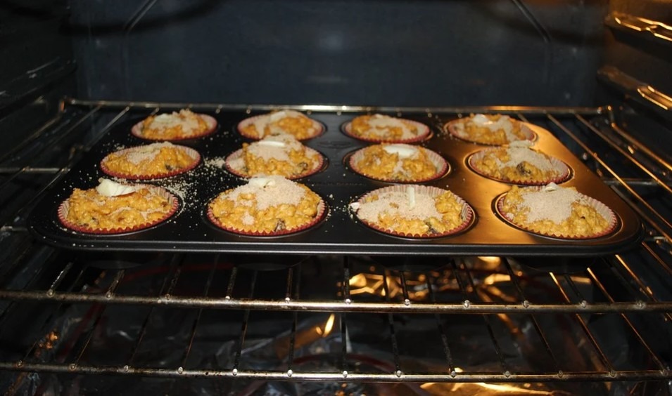 Picture of muffins in an oven