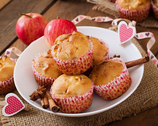 fruit-muffins with fresh organic apples and heart props