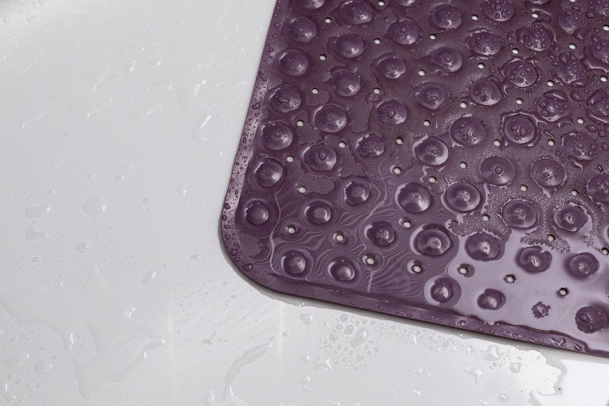 a purple anti-slip bath mat