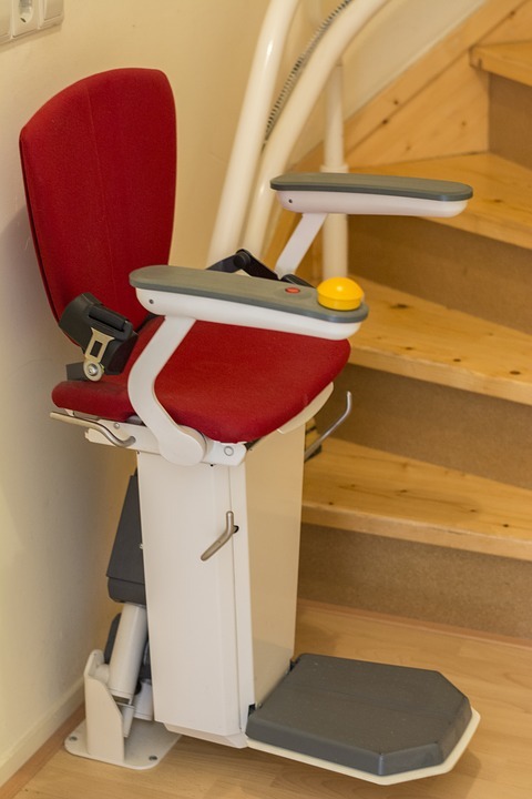 stair lift with a red seat