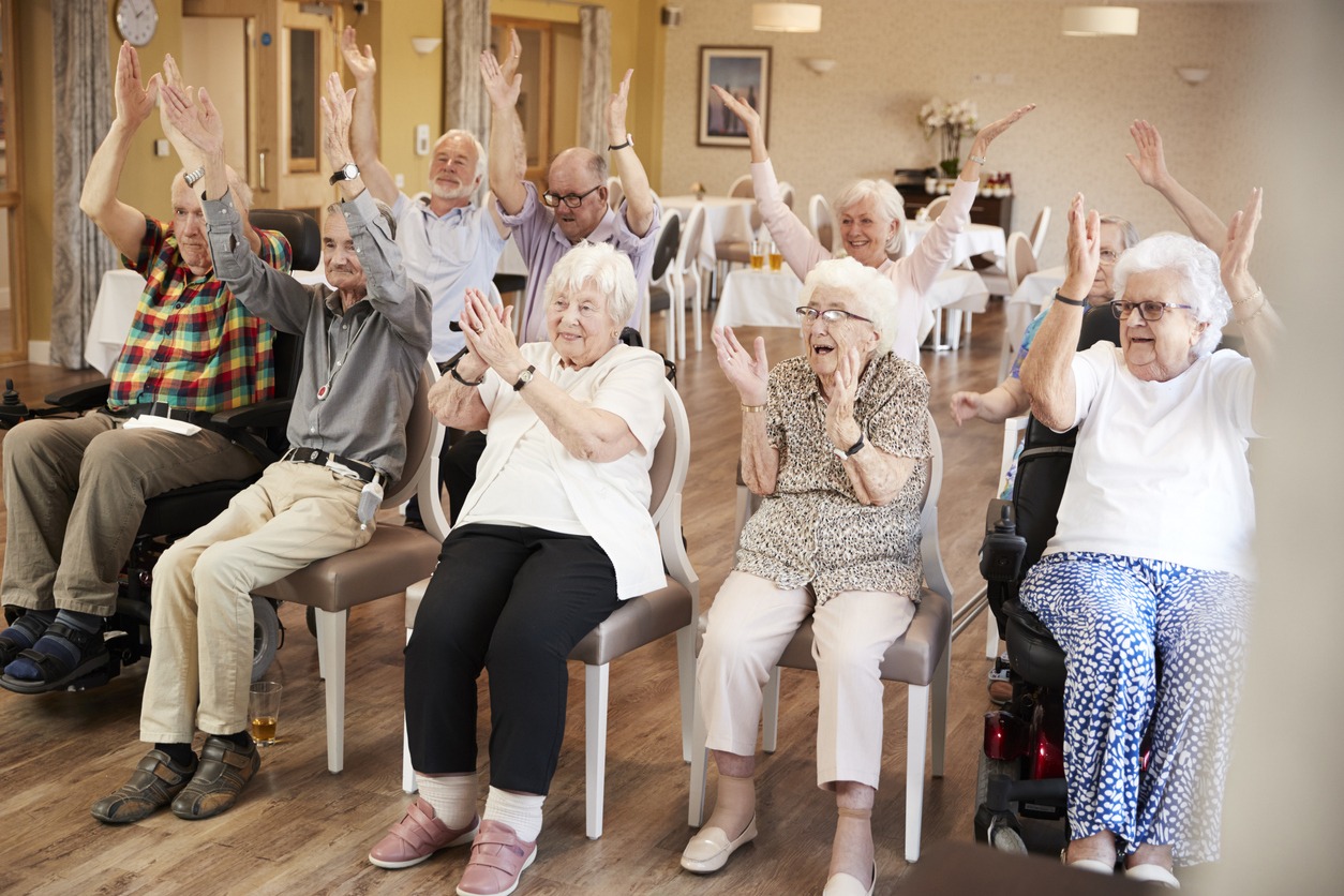 a group of older adults in an assisted living community