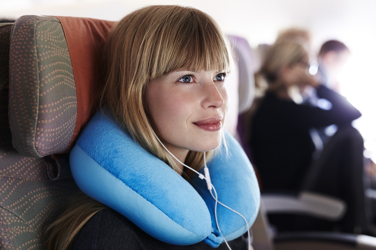 woman using a neck pillow