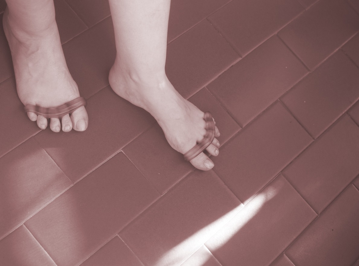 toe separators on a woman’s feet