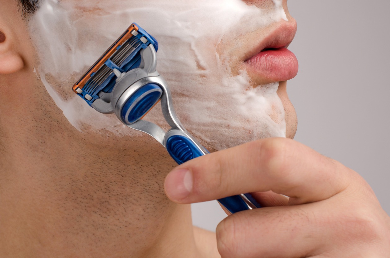 Shaving the beard with a razor