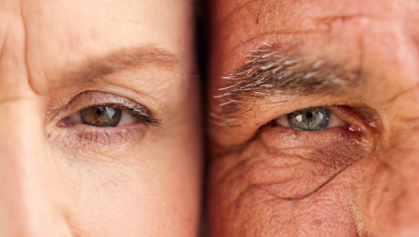 close up faces of two older adults