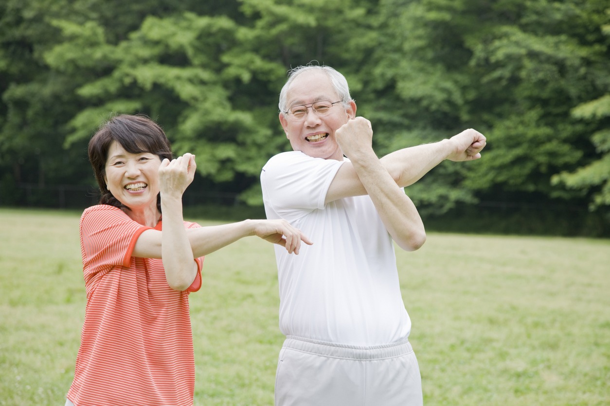 elderly couple exercising together