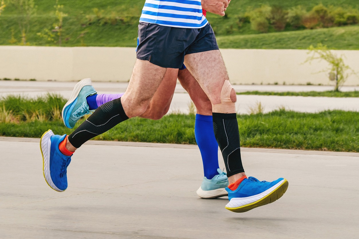 runners wearing athletic compression socks