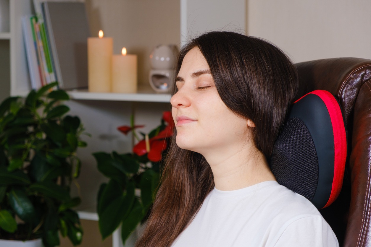 woman enjoying a neck massage