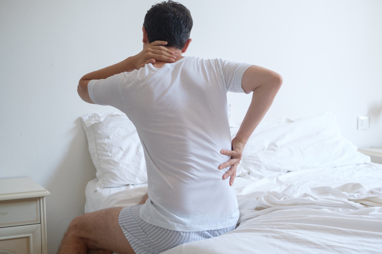 man woke up with back pain